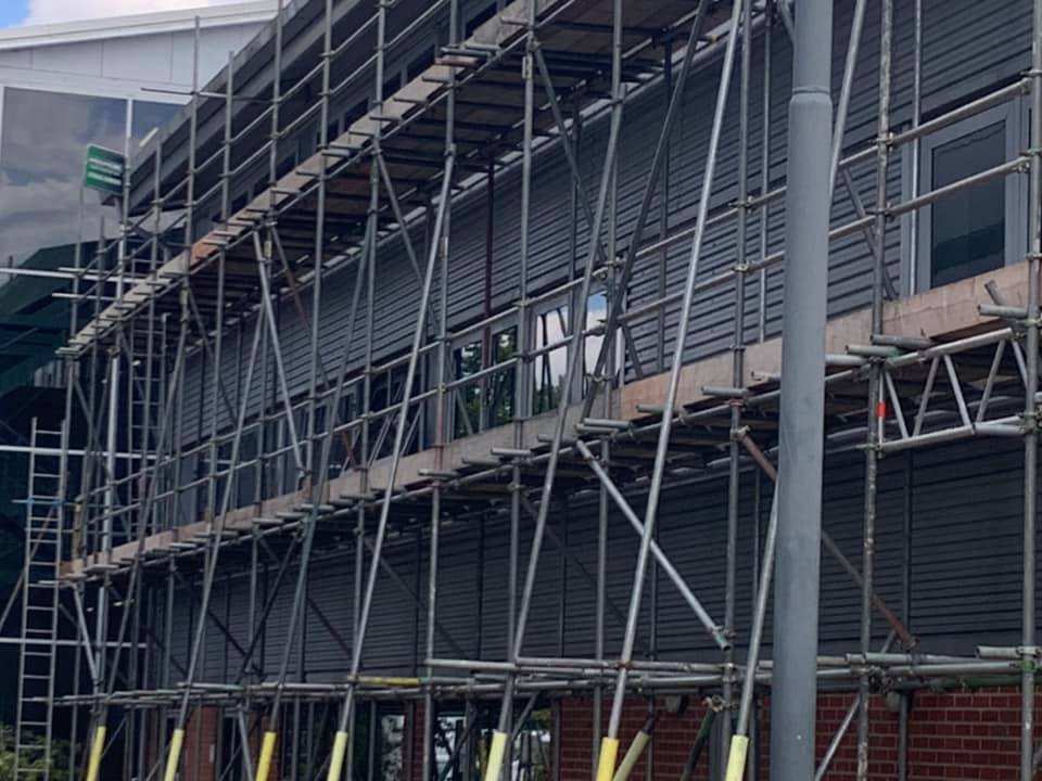 Scaffolding on a grey building