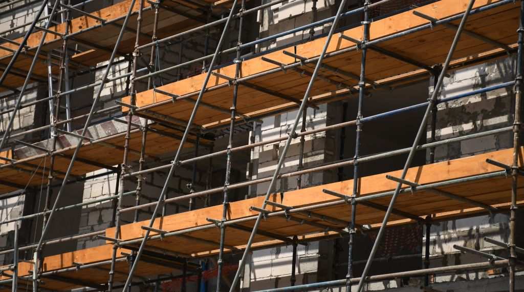 Scaffolding with Toe Boards surrounding the scaffold boards for protection